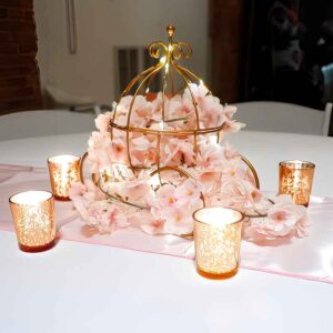 PUMPKIN CARRIAGE WITH FAIRY LIGHTS AND ARTIFICIAL FLOWERS